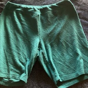 Green biker shorts. Size L